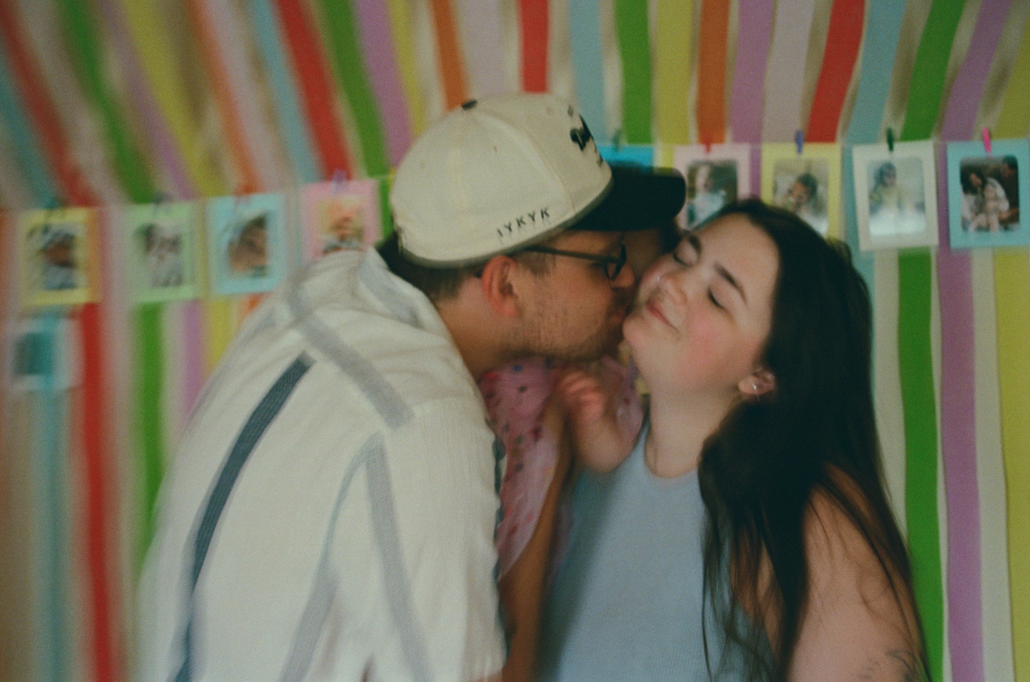 Emily and her husband sharing a playful moment