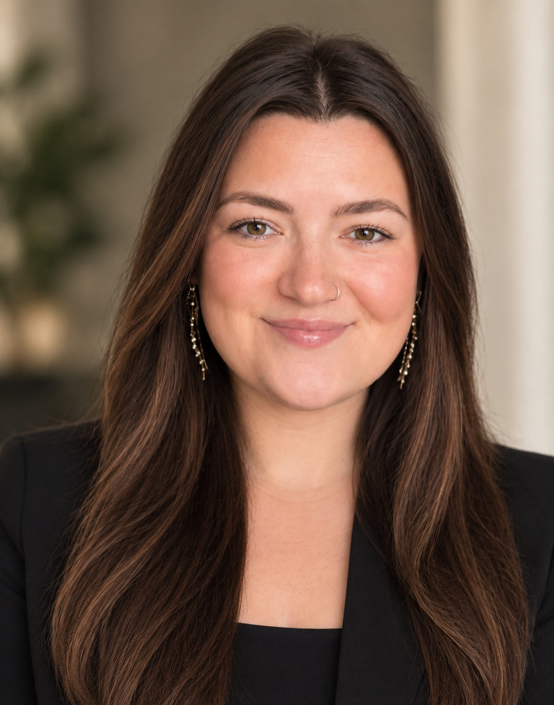 Emily Cory smiling in a professional headshot